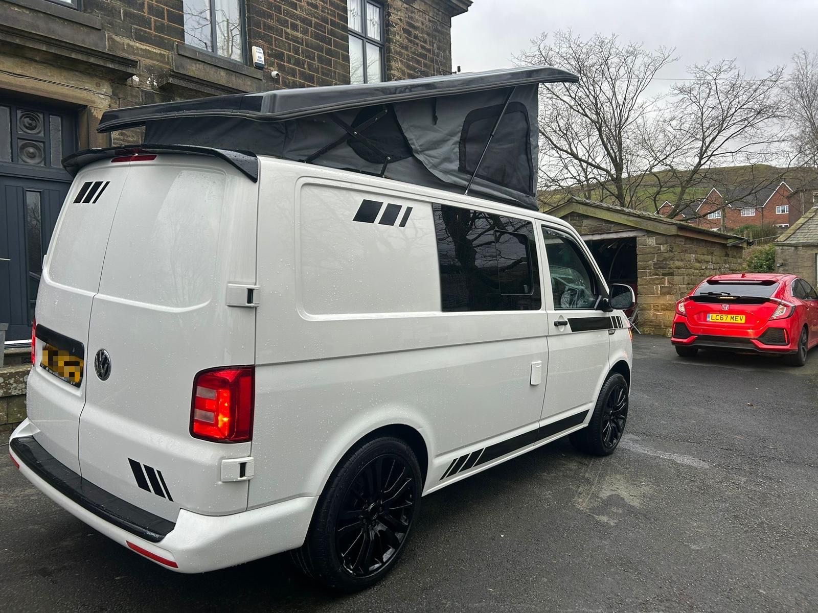 Family-friendly Volkswagen T6 camper van for hire in the North West from NW Car Hire, designed for comfort and convenience.